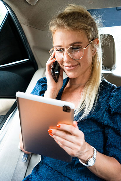 beautiful business women driving at the airport leaving on for a working travel